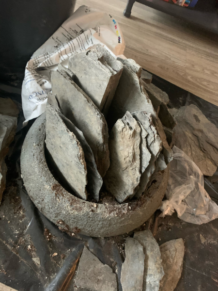 The process of building a crevice garden in a conatiner. The process of building a crevice garden in a conatiner.