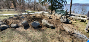 Site of the rock garden with a view of the Hudson River beyond