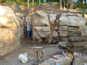 Mary cleaning out a crevice created by a glacier. Mary cleaning out a crevice created by a glacier.