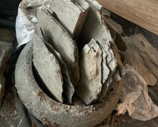 The process of building a crevice garden in a  conatiner.