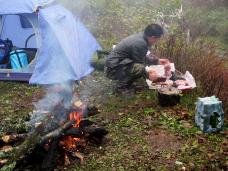 Preparing food in camp