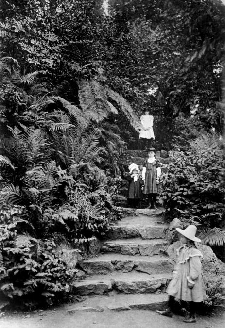 A circa 1900 photograph looking west of the rockery’s rustic stone stairway. 