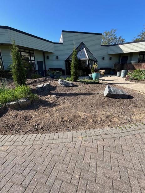 Graded and new boulders in place