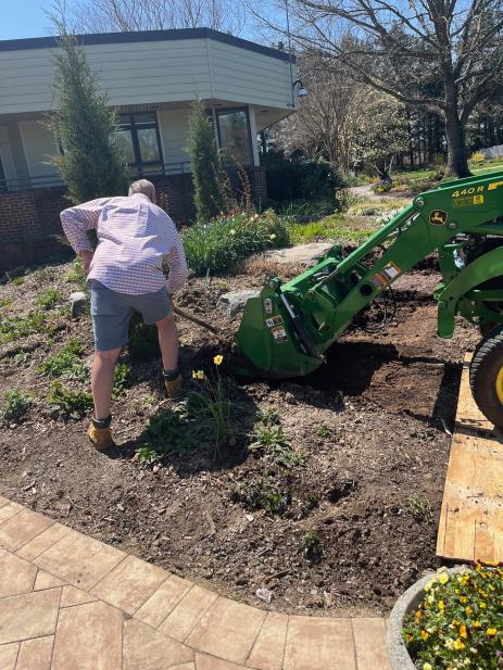 Regrading the new garden space